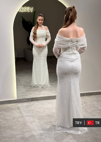 41 Beden Drapeli Uzun Kollu Beyaz Abiye Elbise kiralıktır