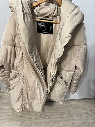 Stradivarius kışlık krem mont