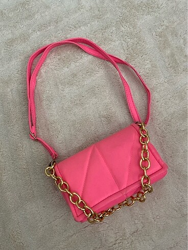 Pembe kol çantası