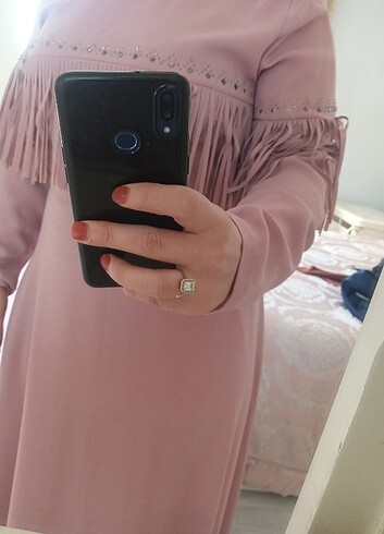Toz pembe elbise. Ürün tertemiz. Sadece bir kere giyildi.