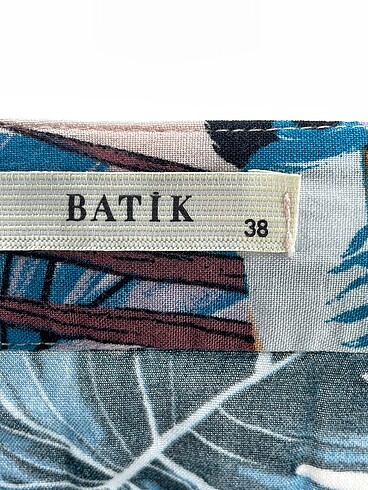 38 Beden çeşitli Renk Batik Midi Etek %70 İndirimli.