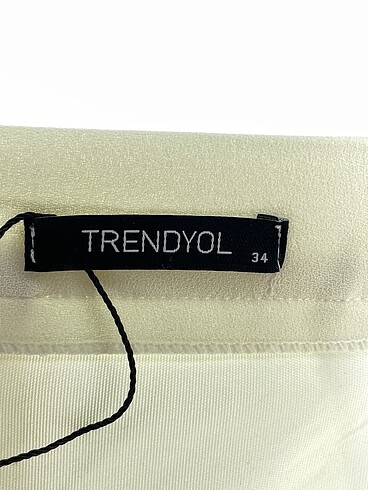 34 Beden çeşitli Renk Trendyol & Milla Kumaş Pantolon %70 İndirimli.