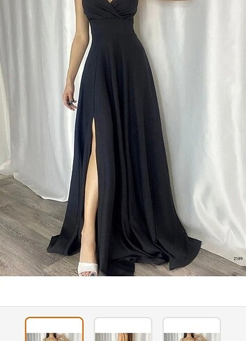 Siyah krep kumaş yırtmaç detaylı abiye elbise