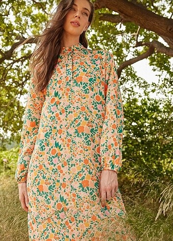 TRENDYOL MİLLA MODEST | Turuncu Çiçekli Yarım Pat Etek Ucu Fırfı
