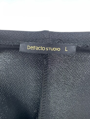 l Beden siyah Renk Defacto Midi Etek %70 İndirimli.