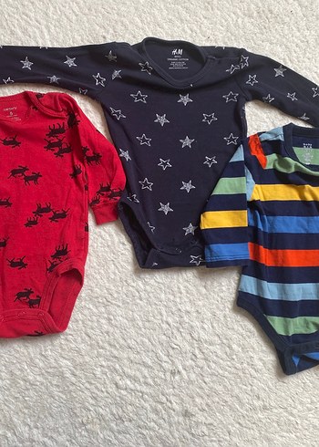 Carters kırmızı, GAP renkli, H&M lacivert çıtçıtlı body