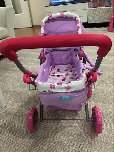 Manhattan Toy Baby Stella marka oyuncak bebek arabası ve puset
