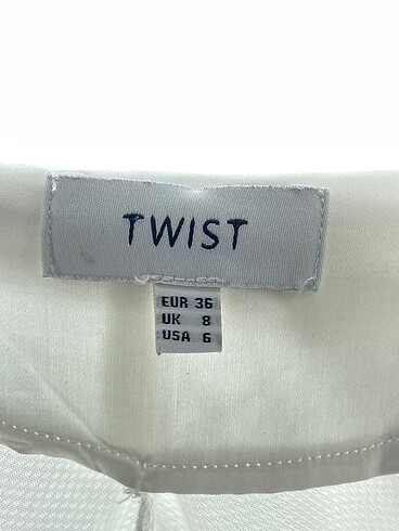 36 Beden beyaz Renk Twist Gömlek %70 İndirimli.