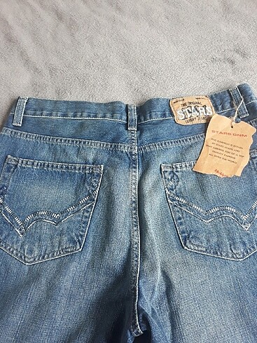 Üzeri etiketli hiç giyilmemiş jeans