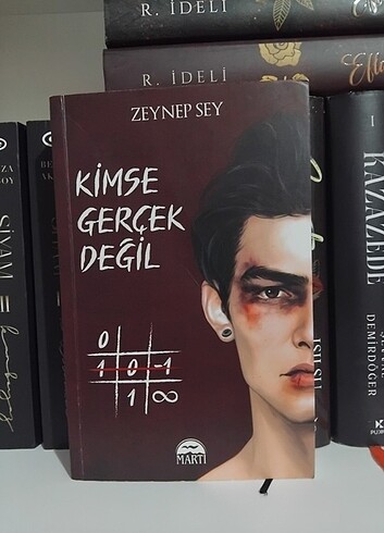 Kimse Gerçek Değil