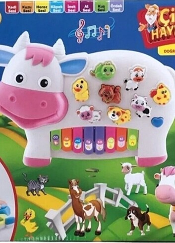İnek figürlü hayvan sesi çıkartan piyano