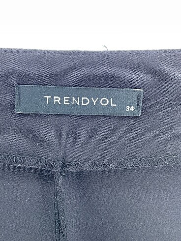 34 Beden siyah Renk Trendyol & Milla Kumaş Pantolon %70 İndirimli.