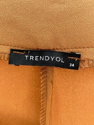 34 Beden çeşitli Renk Trendyol & Milla Kumaş Pantolon %70 İndirimli.