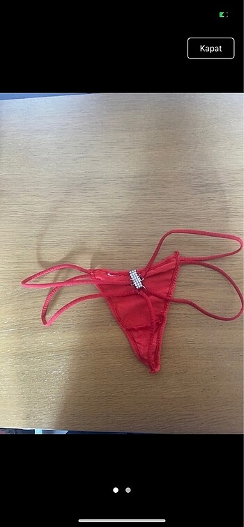 Kirmizi tasli tanga