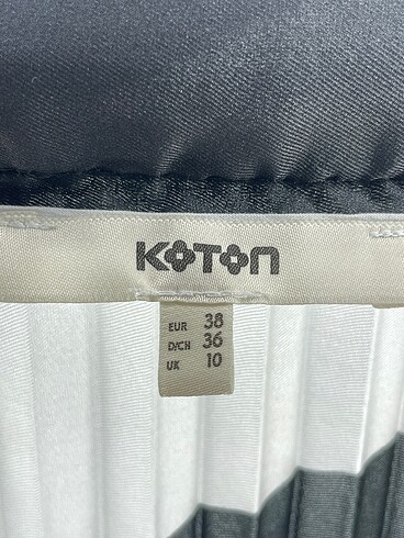 38 Beden çeşitli Renk Koton Midi Etek %70 İndirimli.