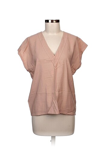 Zara Bluz %70 İndirimli.