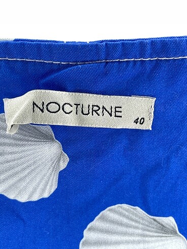40 Beden mavi Renk Nocturne Bluz %70 İndirimli.