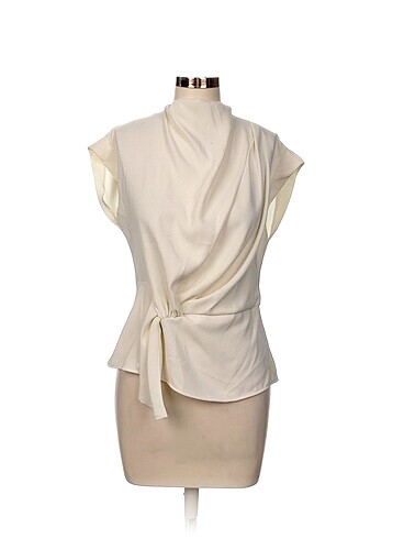 Zara Bluz %70 İndirimli.