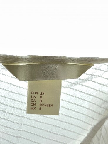 38 Beden beyaz Renk H&M Bluz %70 İndirimli.