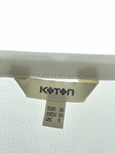 36 Beden beyaz Renk Koton Bluz %70 İndirimli.