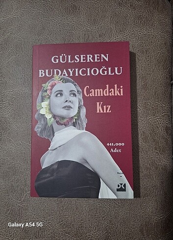 CAMDAKİ KIZ