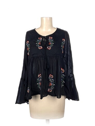 Zara Bluz %70 İndirimli.