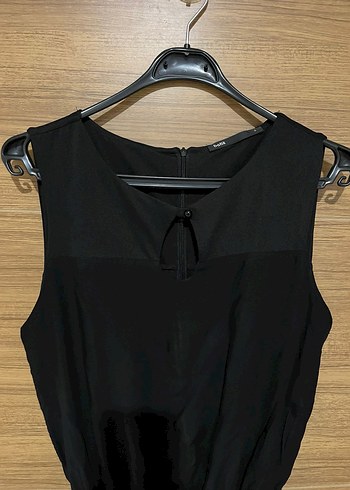 Siyah Yüksek Yakalı Kolsuz Tulum - Görsel 6