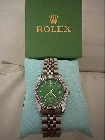 Rolex gümüş saat