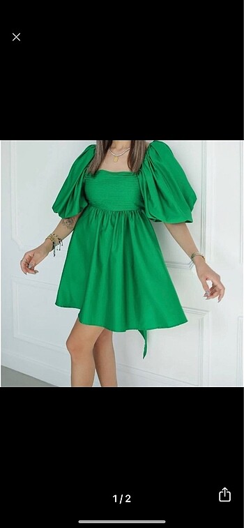 Yeşil arkası fiyonklu balon elbise