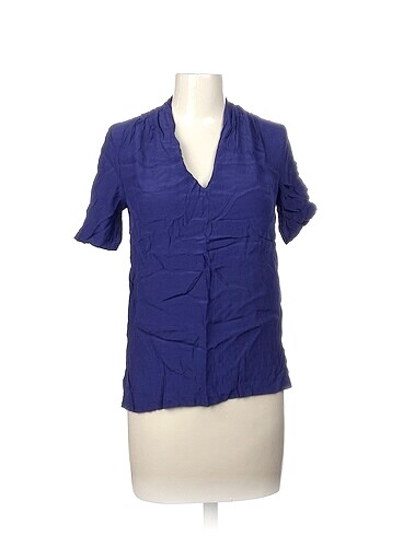 Mango Bluz %70 İndirimli.