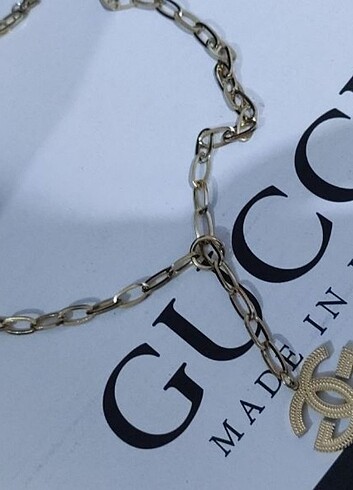Beden Gucci kolye ambalajında etiketli sıfır ürün