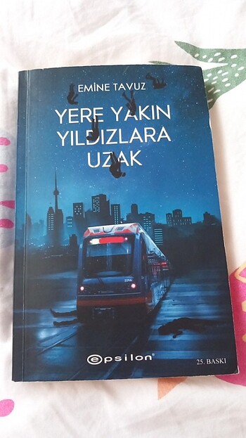 yere yakın yıldızlara uzak emine tavuz