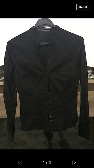 xs Beden Siyah gömlek bir kere giyildi