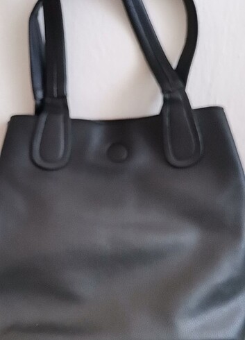 Yenidir siyah deri kol çantası 