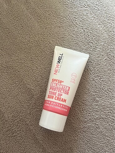 New Well pembe güneş kremi