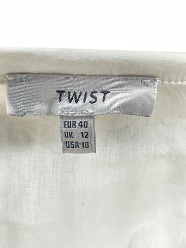 40 Beden beyaz Renk Twist Gömlek %70 İndirimli.