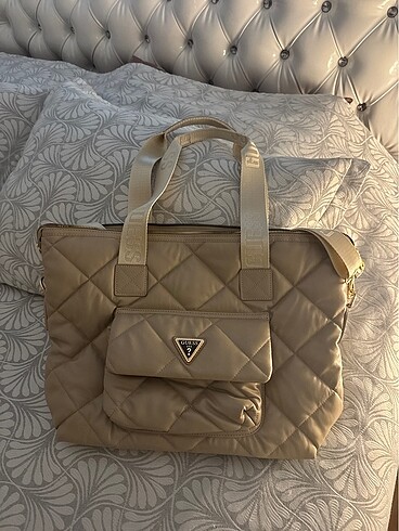 Guess model su geçirmez çapraz askı ve kol askılı deri model kol