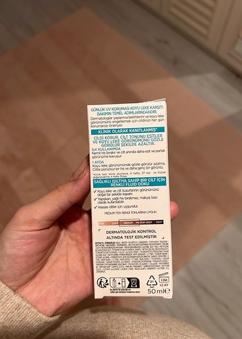 L'Oréal Bright Reveal SPF 50 Orta Tonlu Yüz Kremi - Görsel 3
