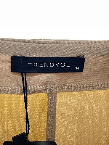34 Beden çeşitli Renk Trendyol & Milla Kumaş Pantolon %70 İndirimli.