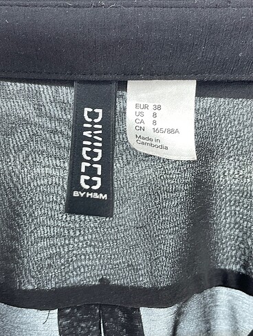 38 Beden siyah Renk H&M Gömlek %70 İndirimli.