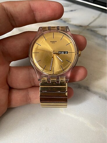 Swatch altın rengi saat