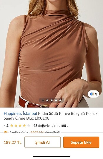 Büzgülü kolsuz örme bluz