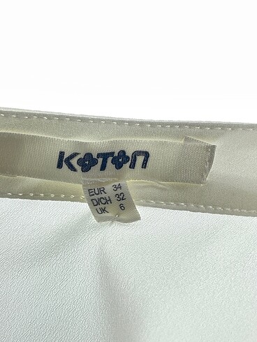 34 Beden beyaz Renk Koton Bluz %70 İndirimli.
