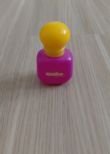 Dışı pembe ve sarı renklerden oluşan mini parfüm - Görsel 3