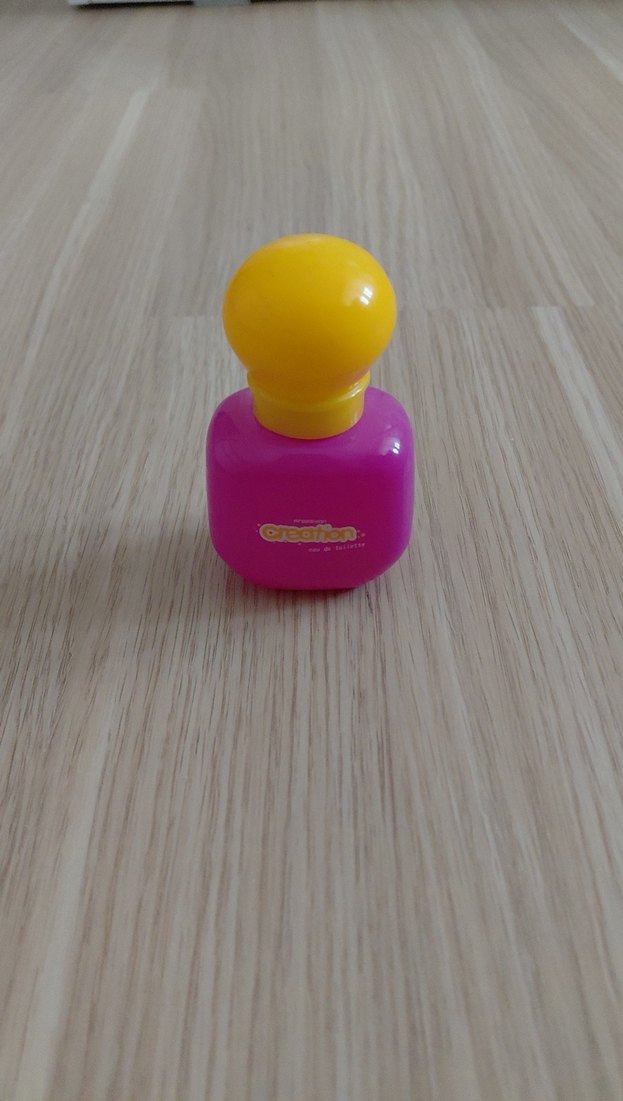 Dışı pembe ve sarı renklerden oluşan mini parfüm - Görsel 3