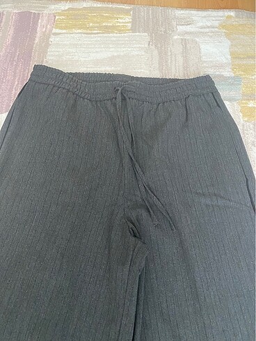 m Beden beli lastikli geniş paça kumaş pantolon koyu gri renkli