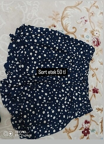 Sort etek