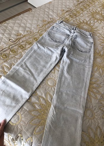 27 Beden gri Renk Gri beyaz paçaları yırtmaçlı kot pantolon