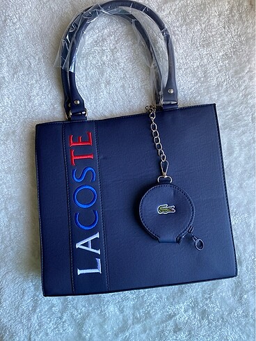 Lacoste kol çantası