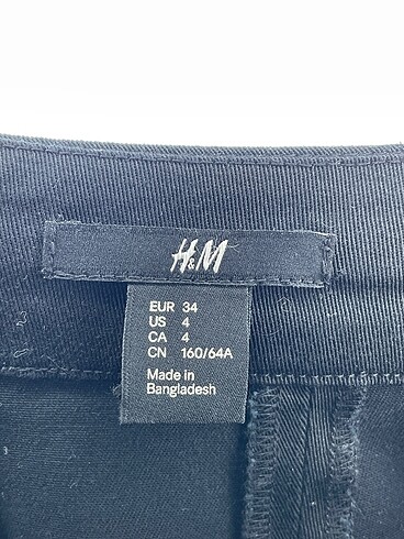 34 Beden siyah Renk H&M Midi Etek %70 İndirimli.